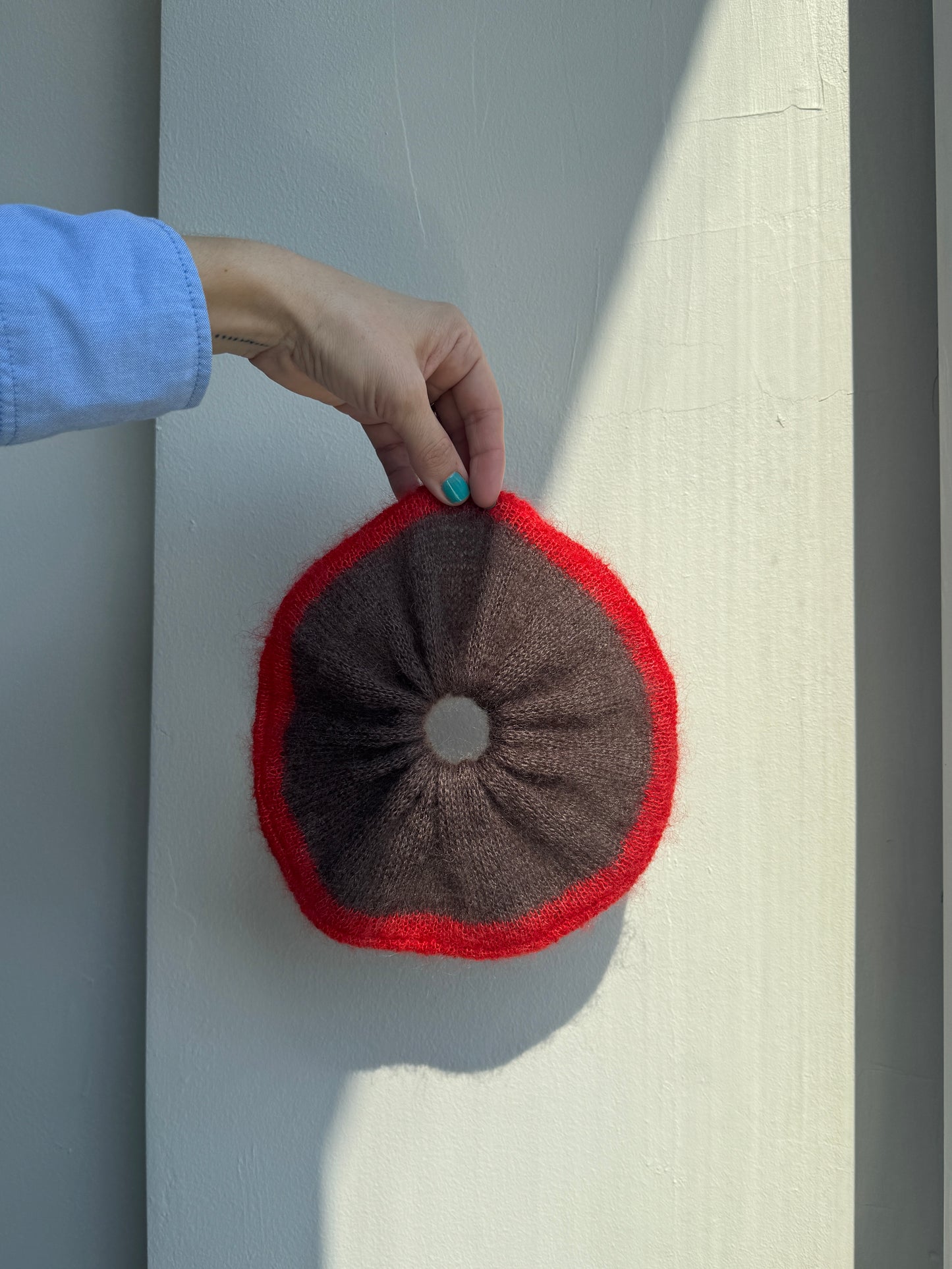 Brown knitted  mohair scrunchie with bright red trim