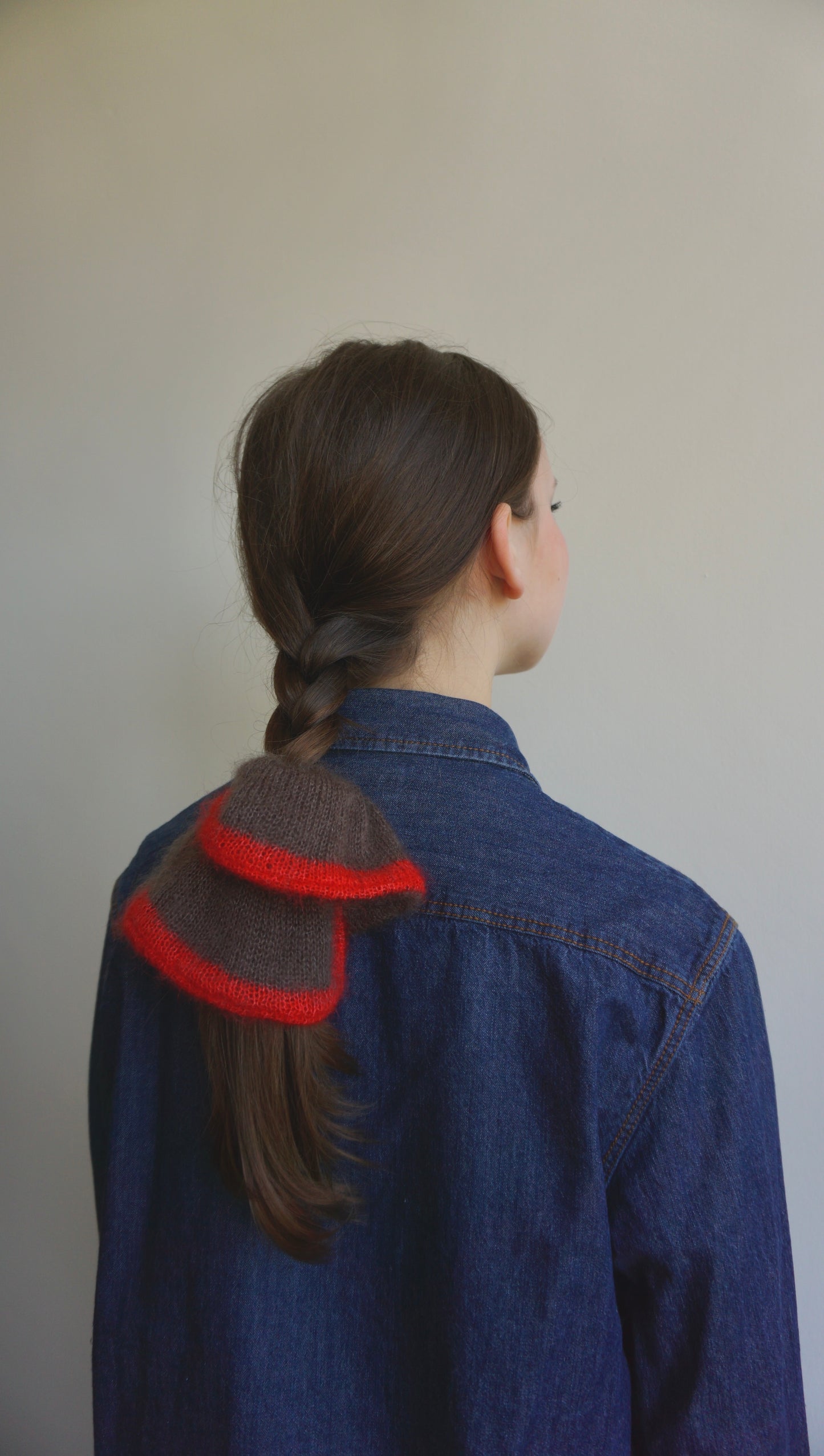 Brown knitted  mohair scrunchie with bright red trim