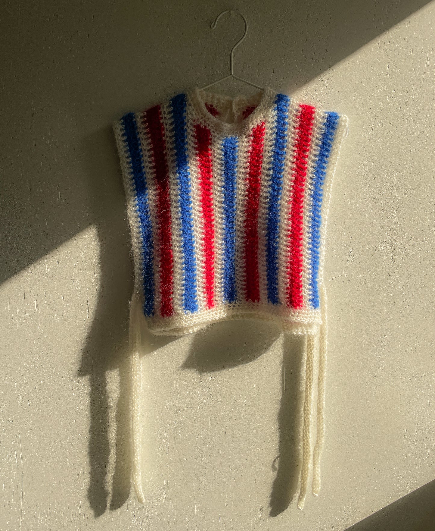 soft striped crochet vest in blue red and white