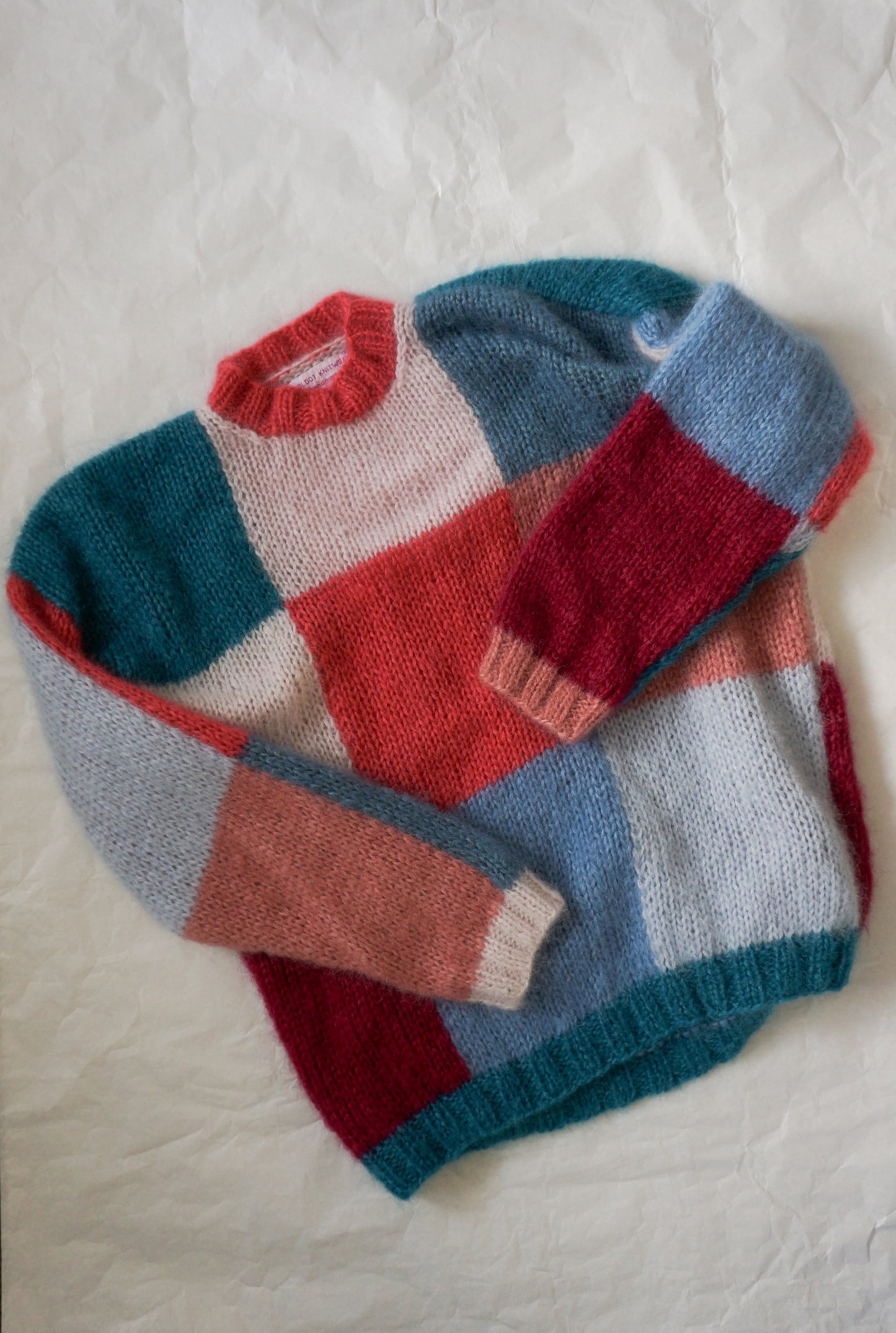 Knitted mohair sweater in pink and blue squares