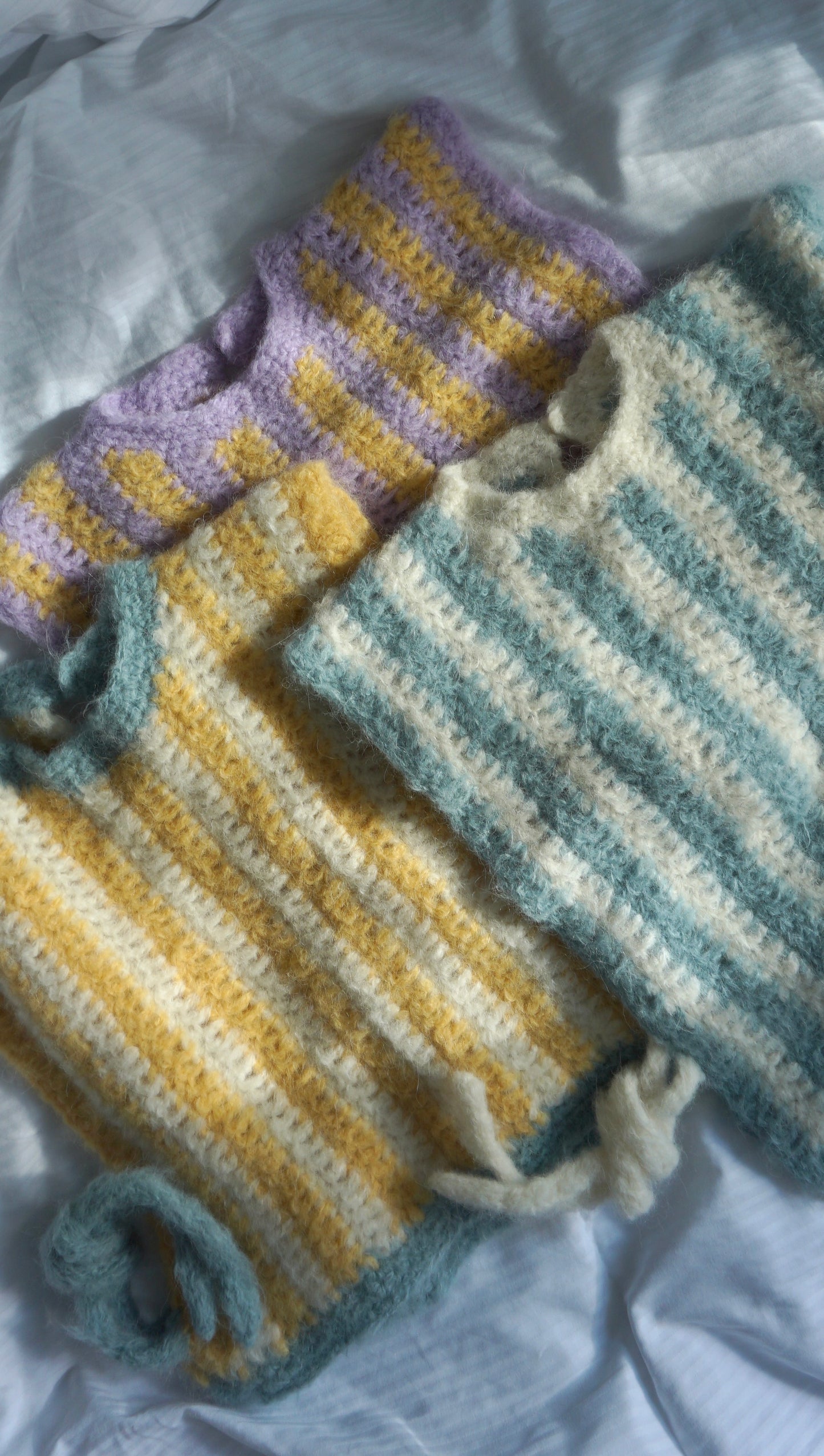 Fluffy striped crochet vest in yellow and purple