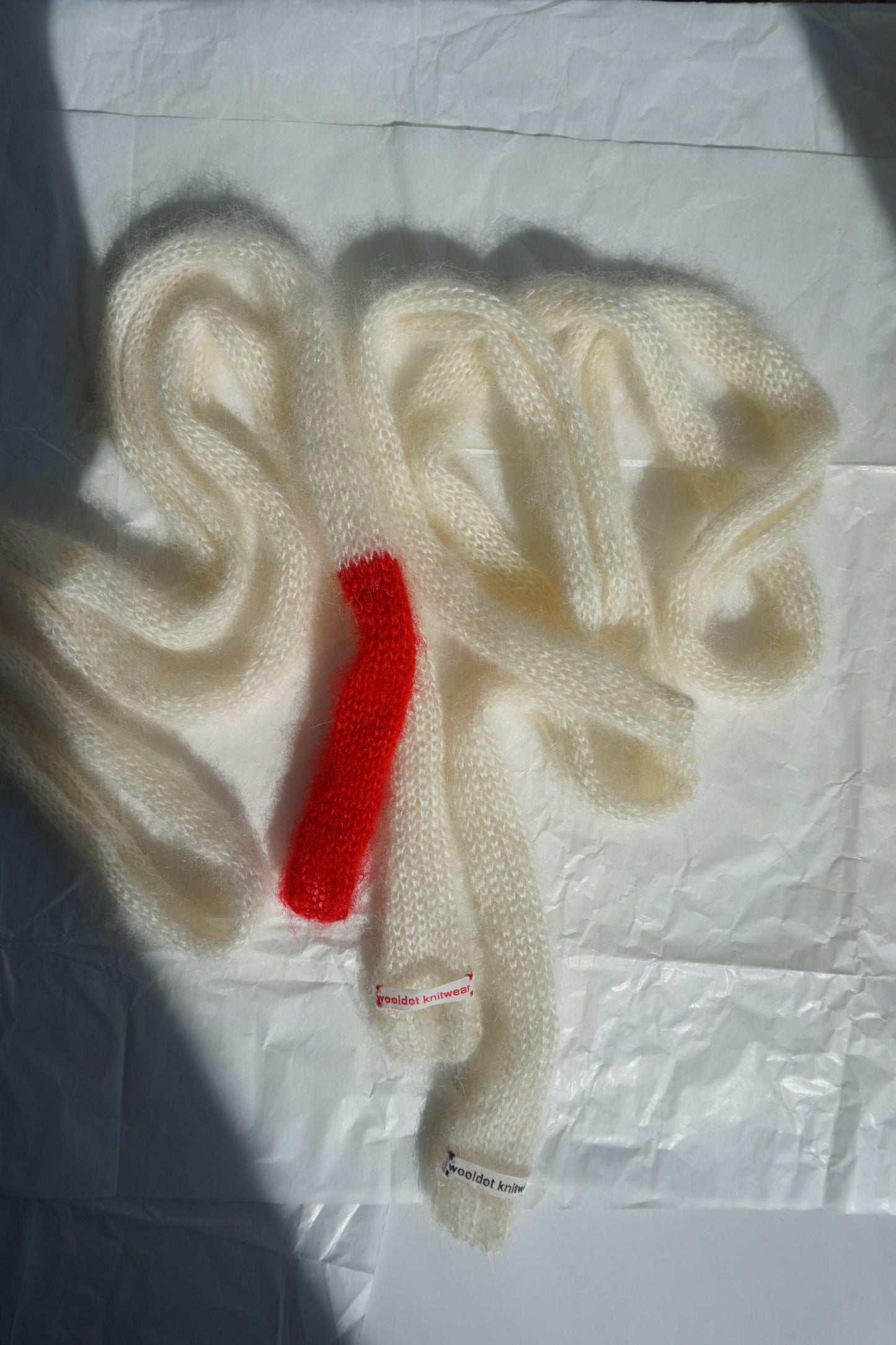 Small skinny white mohair scarf with bright red tip