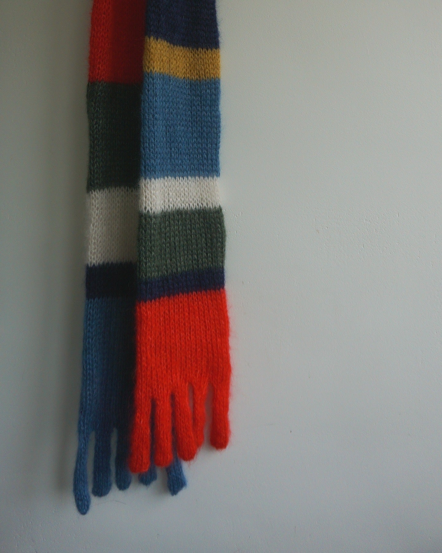 Colourful mohair scarf with knitted fringes