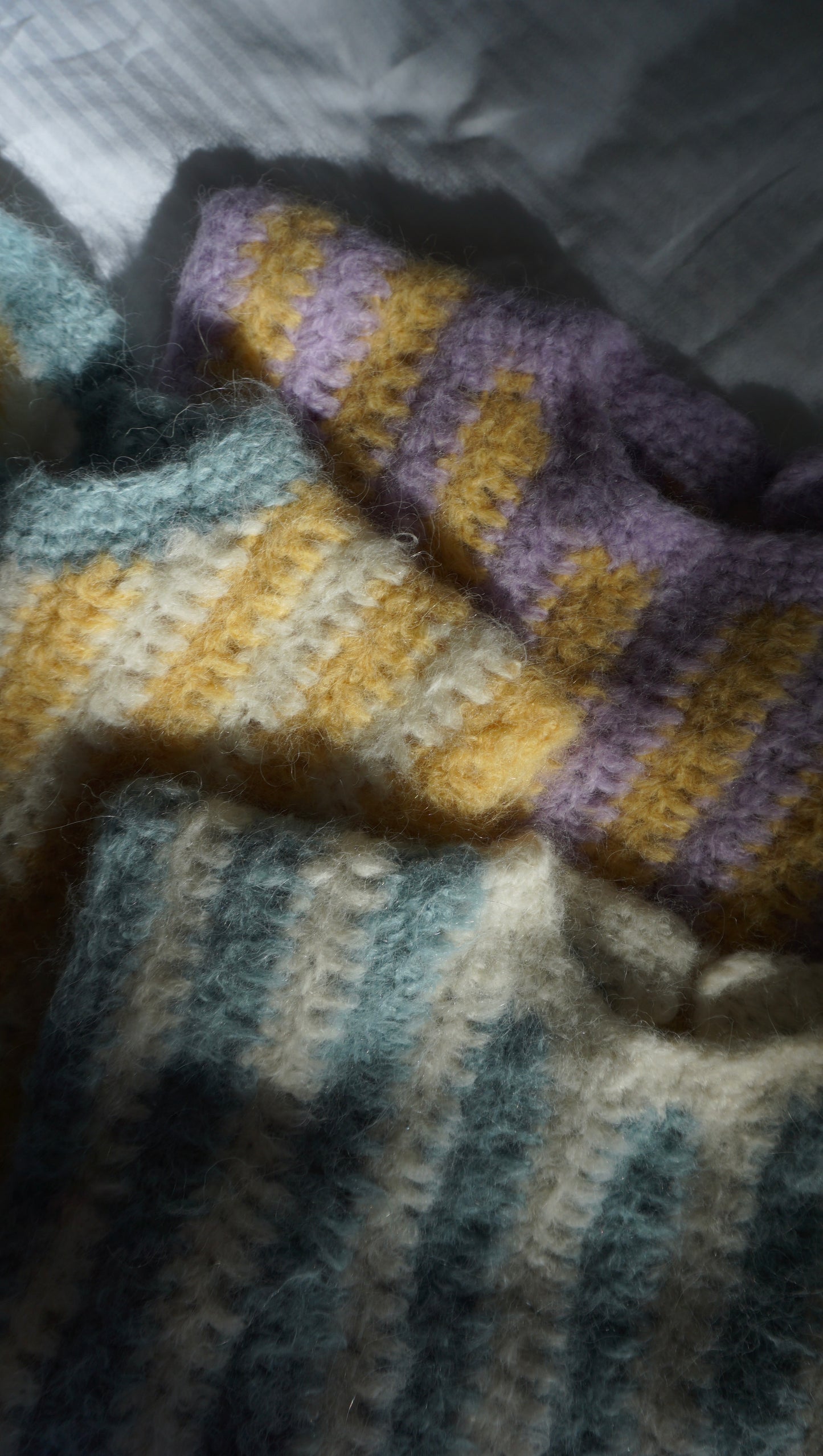 Fluffy striped crochet vest in yellow and purple