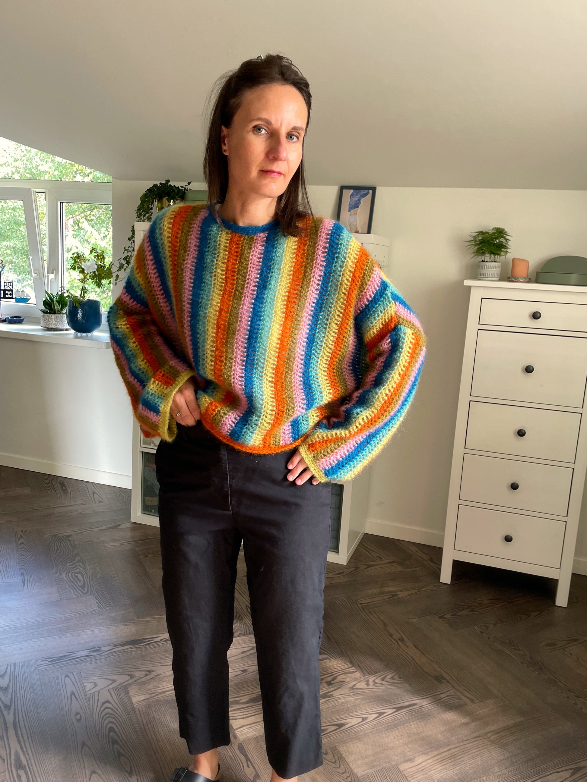 woman wearing colourful vertical stripes mohair crochet sweater