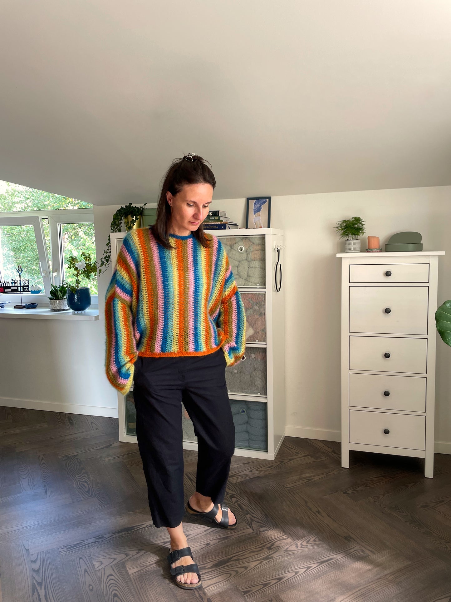 woman wearing colourful vertical stripes mohair crochet sweater